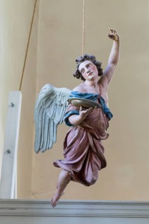 Baroque baptismal angel in Panitzsch church, Borsdorf, Leipzig district, Saxony, Germany