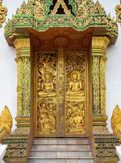 Close-up of gilded door at Wat Ho Pha Bang pavilion, Royal Palace, Luang Prabang, Laos