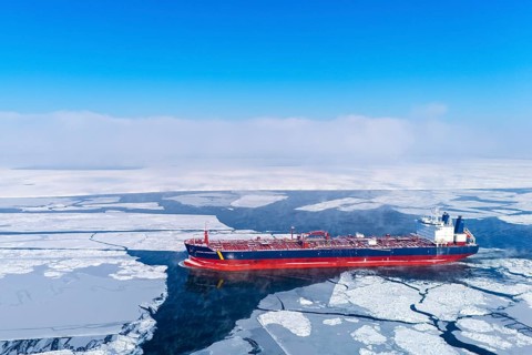 LNG carrier going up the frozen St. Lawrence River, Region of Center Quebec, Province of Quebec,