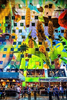 Markthal from 2014, offers over 100 food stalls and delicatessens with spectacular ceiling fresco