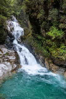 Waterfall with rocks, Christie Falls, Falls Creek, Fiordland National Park, Southland Region, South