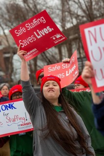Lapeer, Michigan USA - 10 April 2026 - Members of the Michigan Nurses Association rally as their