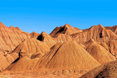 Stark and beautiful ridges of Devil's Desert, showcasing the rugged terrain and rich, earthy colors