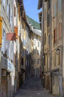 Narrow alley in the old town centre of Briançon, Département Hautes-Alpes, France