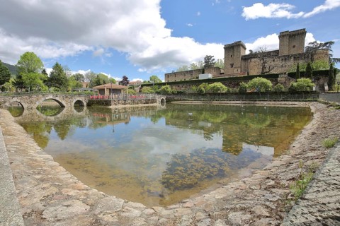 Historic Castillo Palacio de los Condes de Oropesa, hotel, palace, castle with pond, bridge and