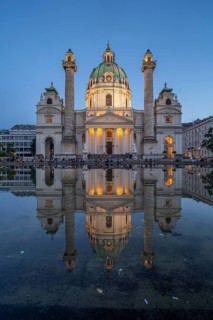 The baroque Karlskirche church at dusk, Vienna, Austria