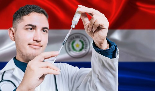 Doctor holding syringe on Paraguay flag background. Medical professional holding syringe with