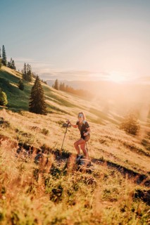 Summer trail running and hiking in the Alps on the Riedberg Pass between Obermaiselstein and