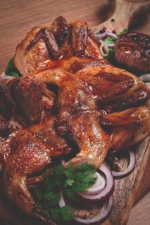 Fried, quail meat, tobacco (tapaka), with spices, homemade, no people