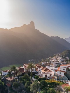 A picturesque scene of Tejeda village in Gran Canaria, capturing the traditional white houses and