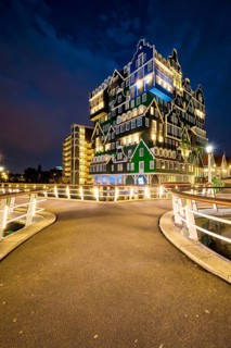 ZAANDAM, NETHERLANDS, MAY 21, 2018: Inntel Hotel in Zaandam illuminated at night. Design of