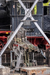 Signal box mechanics, with rollers and wires that mechanically control the corresponding switches