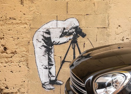 Artistic graffiti on a house wall in Carrer de Sant Pere, Palma de Majorca, Spain