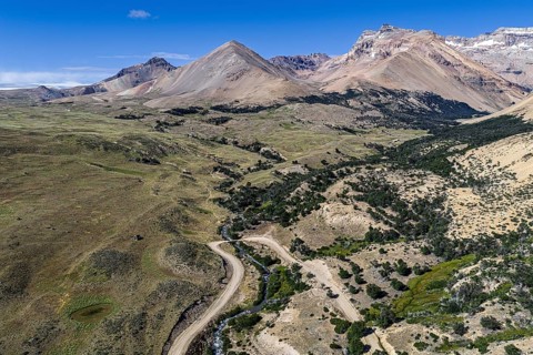 Road Ruta 41, gravel road, arid volcanic landscape, Los Antiguos - Paso Roballo, aerial view,