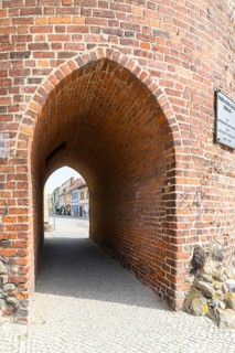 Passage to the town centre through the Luckauer Torturm or Dicker Turm as a medieval part of the