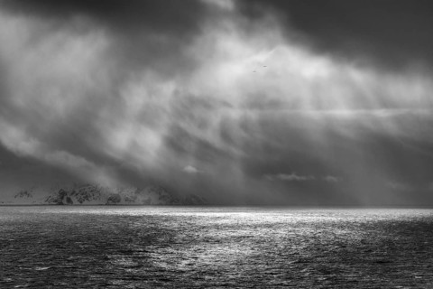 Dramatic lighting over the Norwegian European Sea, Söröya, Finnmark, Norway, March 2019