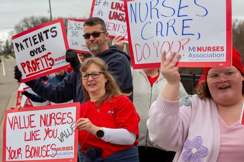 Lapeer, Michigan USA - 10 April 2026 - Members of the Michigan Nurses Association rally as their