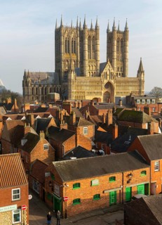 West frontage of Lincoln cathedral church viewed from castle walls, city of Lincoln, Lincolnshire,