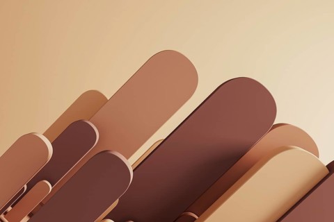 Abstract background features soft geometric shapes in warm tones, creating a serene atmosphere for