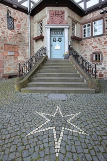 Staircase and entrance to the Schwalm Museum, stone house, half-timbered house, pentagonal star as