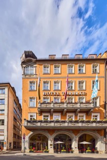 Hotel Torbräu, historic commercial building, German Renaissance style, balcony, dormers, façade