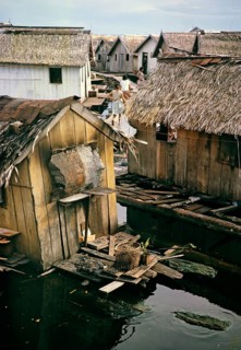 Informal housing built on logs, known as the floating city, Manaus, Brazil 1962, which was removed