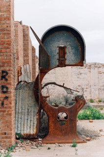 Rusted industrial band saw, abandoned Swift factory, The Swift refrigerator in Puerto San Julián,