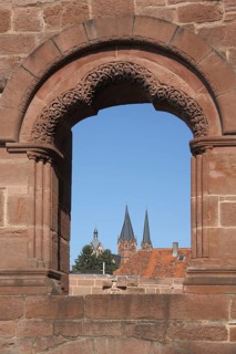 Kaiserpfalz with view through window, wall on St. Mary's Church, Gelnhausen, Hesse, Germany