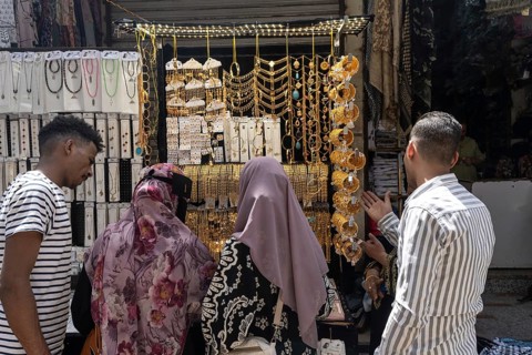Cairo, Egypt. April 3rd 2025. People buying gold along Sharia al Muski a busy local shopping street