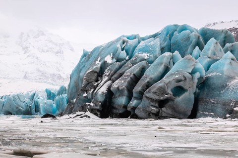 Glacier lagoon, frozen glacial lake, glacier ice, mountain, snow, winter, Svinafellsjökull,