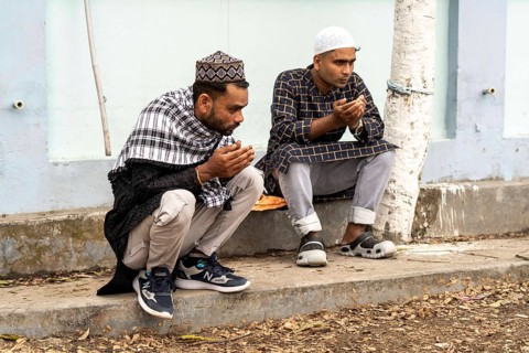 Muslims attend to Eid al-Fitr prayer at Eidgah, on March 21, 2026 in Guwahati, India. Muslims make