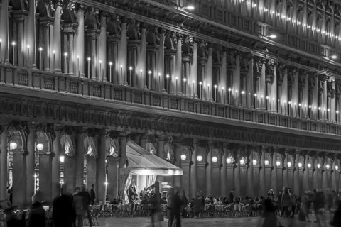 Authorized parties in a nocturnal atmosphere with band on St. Mark's Square, black and white,