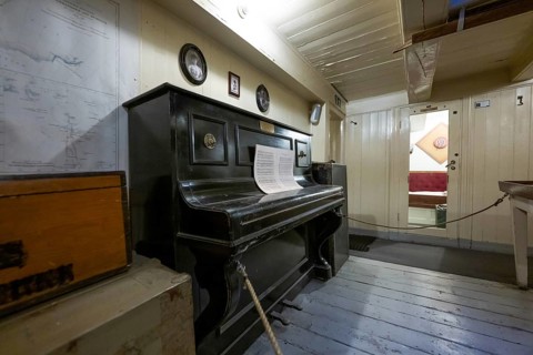 Piano, officers' mess, lounge, historic polar research vessel Fram, wooden ship, by Fridtjof Nansen