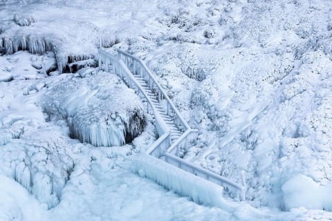 Icy staircase at Seljalandsfoss, Rangárþing eystra, waterfall, icicles, snow, winter, Iceland,