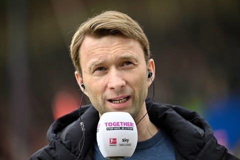 Interview microphone logo SKY in the hand of managing director sports Simon Rolfes Bayer 04