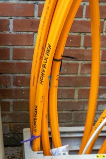 Distribution box in which empty conduits for fibre optic cables arrive and are connected, in which