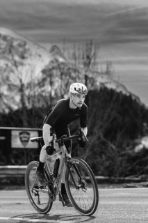 Road bike rider in spring between Lechtal and Tannheimer Tal in front of picturesque scenery of the