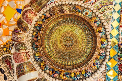 Wall covering with colorful mosaic tiles and incorporated bowls, Buddhist temple complex Wat Phra