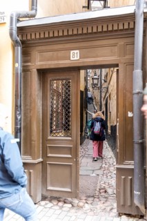 Only one door wide is Mårten Trotzigs Gränd in the old town Gamla Stan, Västerlånggatan 81,