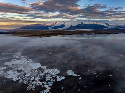 Ice floes, glacier, glacier tongue, fog, clouds, morning mood, mountains, reflection, aerial view,