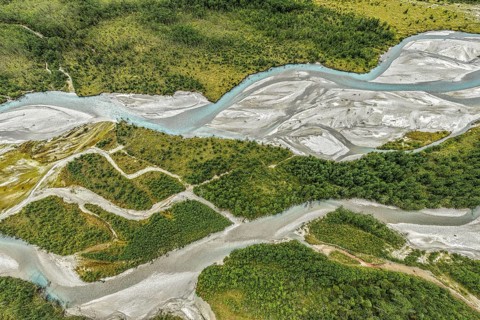 The widely branching arms of river Jostedalsola, Jostedal river, a glacial river originating in the