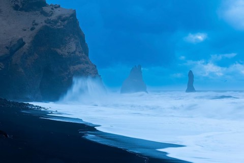 Reynisdrangar pinnacles, lava sandy beach, lava rocks, sea, waves, surf, blue hour, Vik, Iceland,
