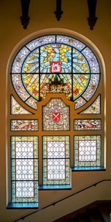 Stained glass window in the main staircase with the town coat of arms by Ferdinand Müller in