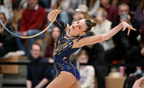 Darja Varfolomeev GER with handheld tire action rhythmic gymnastics RSG gymnastics Schmiden