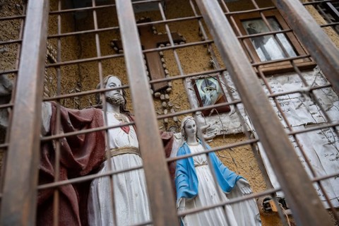 Damascus, Syria. December 10th 2025. Christian icons and symbols on display in a narrow street of