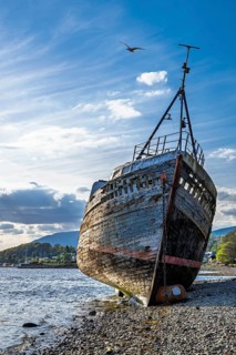 Corpach Wreck or Old Boat of Caol and Nevis Range Mountains, Caol Beach, Corpach, Fort William,