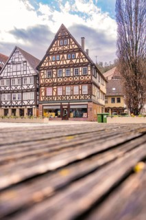Picturesque half-timbered houses with characteristic patterns under a blue sky, Nagold, Calw