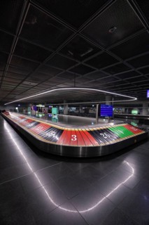 12.03.2026 baggage carousel styled like casino roulette during Lufthansa strike and route closures