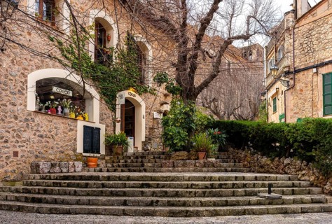 Urban architecture and house facades in the picturesque mountain village of Valdemossa, Majorca,