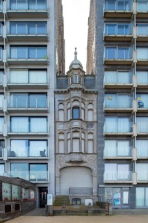 Belle Epoque-villa Doris sandwiched between modern apartments, flats on the promenade at seaside